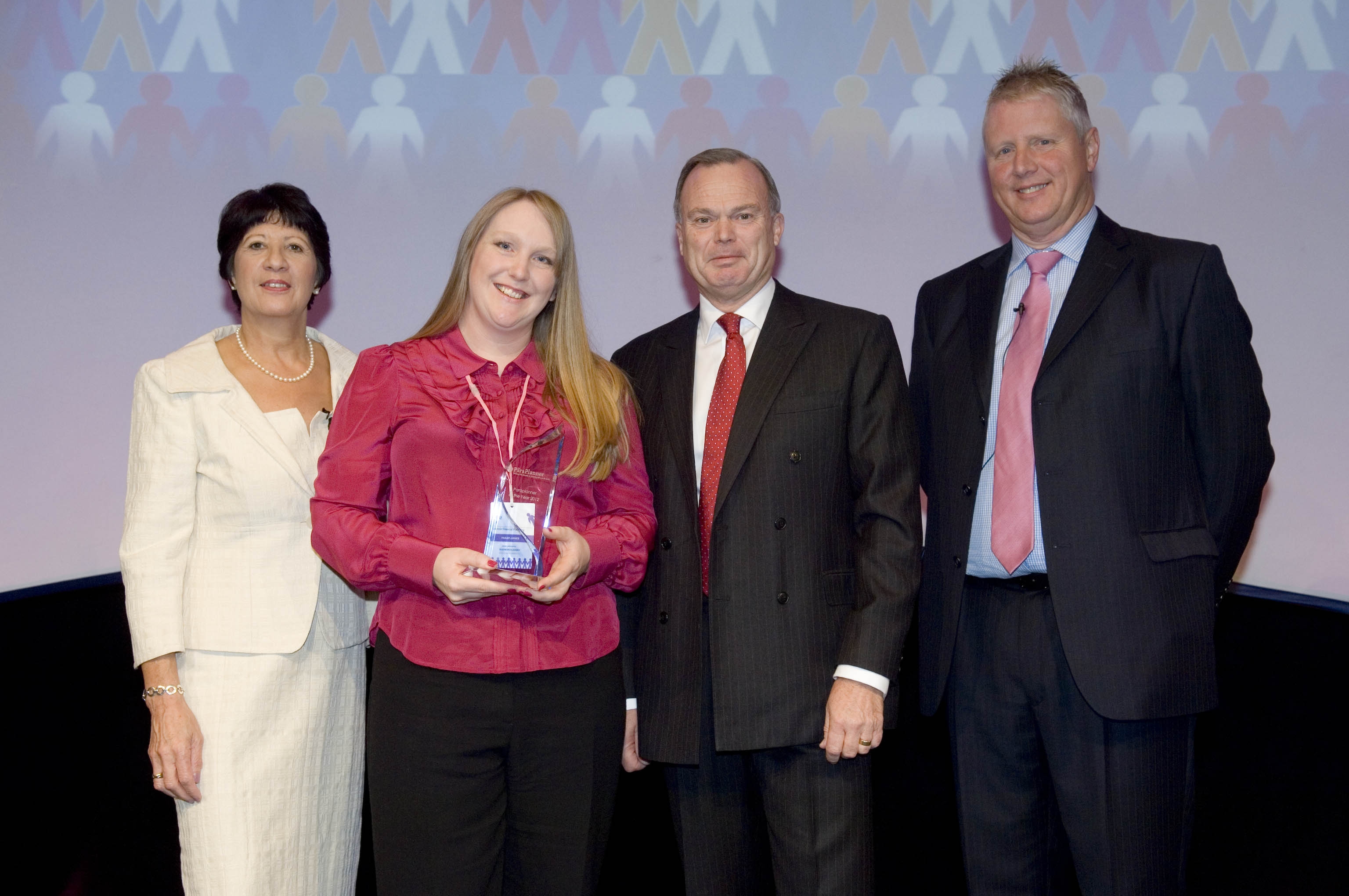 Jane Holt receiving her award in 2012