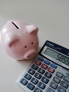 Piggy bank and calculator