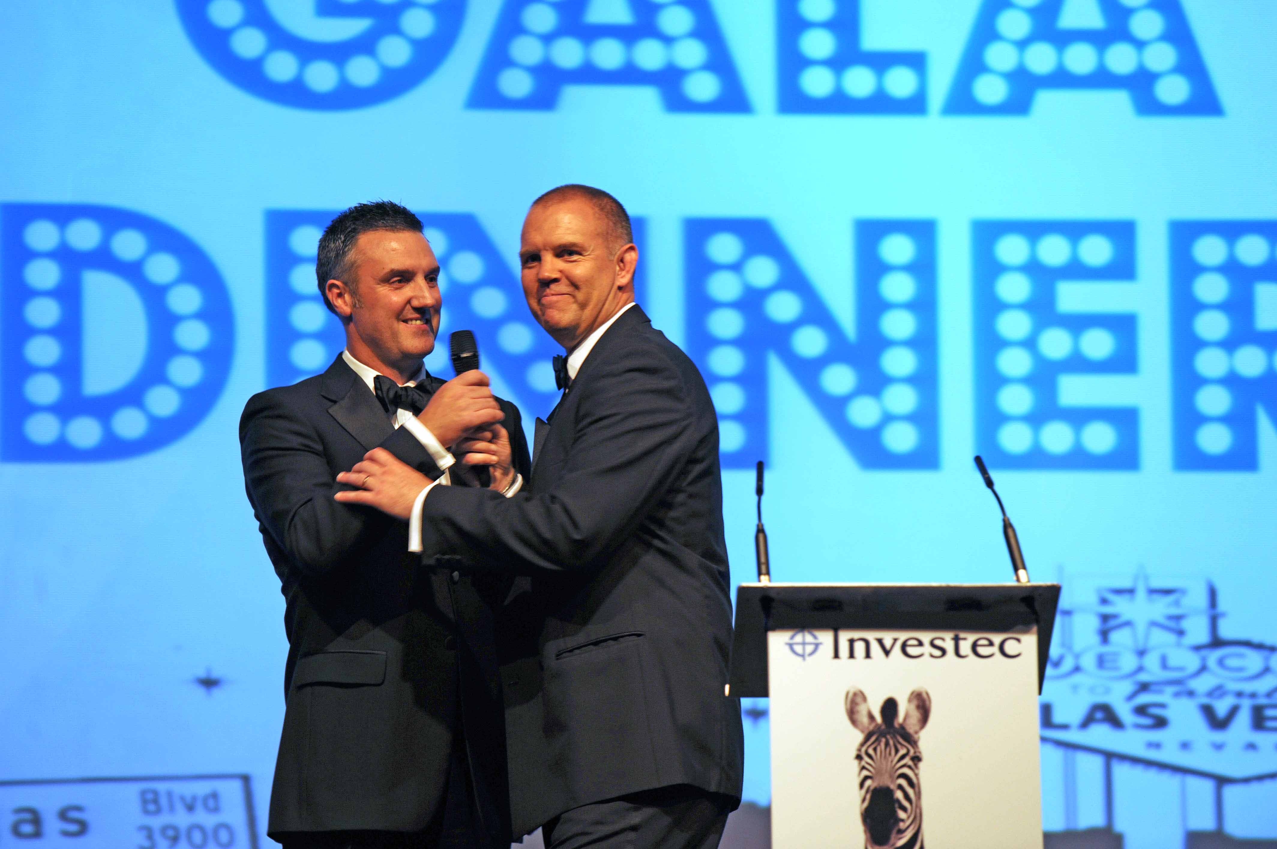 IFP's Steve Gazzard and Gary Dale of Investec Structured Products share a joke on stage