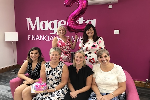 The team celebrate Magenta's two-year anniversary