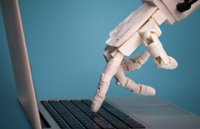 Robot using a laptop. Source; Shutterstock