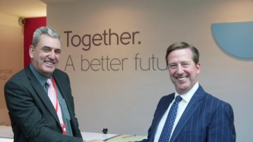 AFH chief executive Alan Hudson, right, welcomes Steve White to AFH Group