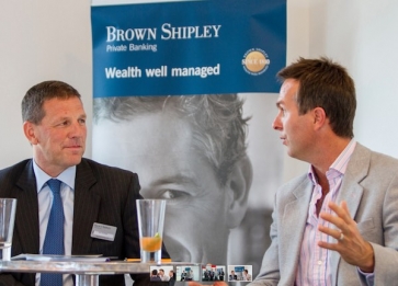 Ian Sackfield, chief executive officer at Brown Shipley, left, at an event recently with former England cricket captain Michael Vaughan